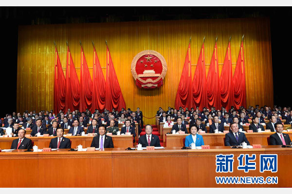 10月1日，慶祝中華人民共和國成立66周年暨新疆維吾爾自治區成立60周年大會在新疆人民會堂隆重舉行。 新華社記者 饒愛民 攝