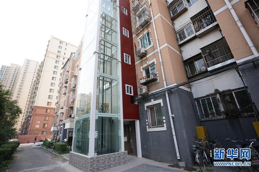 （新華全媒頭條·圖文互動）（3）88級臺階，終于不再是座“山”？——北京老舊小區加裝電梯現狀調查