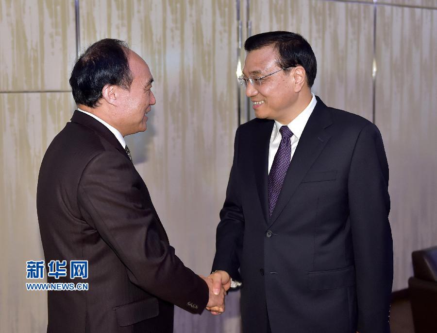 1月22日，中國國務院總理李克強在瑞士蘇黎世會見國際電信聯盟秘書長趙厚麟。 新華社記者 李濤 攝 
